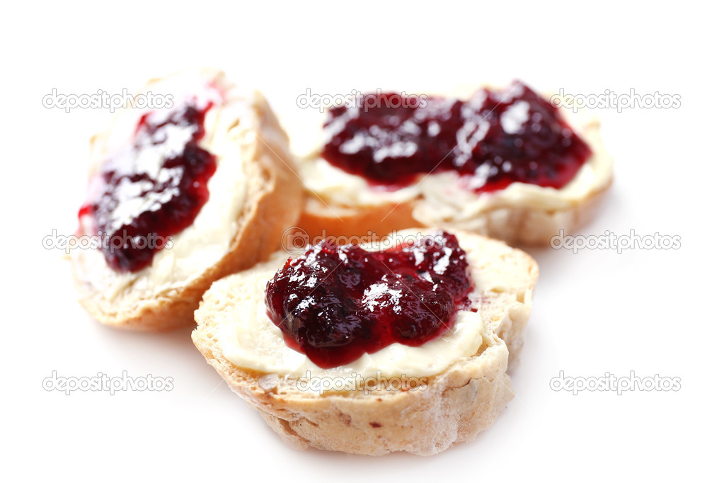Bread with blackcurrant jam and butter