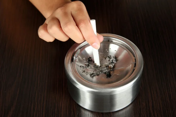 Metal ashtray and cigarette — Stock Photo, Image