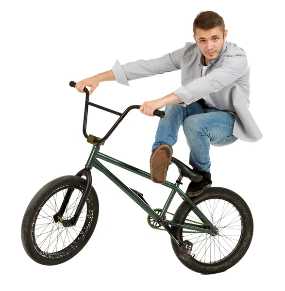 Jovem na bicicleta BMX isolado no branco — Fotografia de Stock