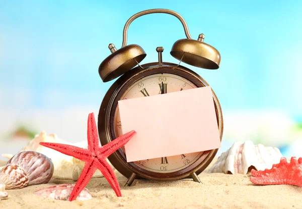 Old clock on sand — Stock Photo, Image