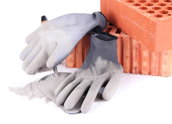 Dirty gebruikt rubber handschoenen en bakstenen — Stockfoto