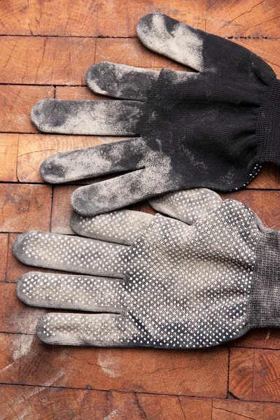 Dirty gebruikte stof handschoenen — Stockfoto