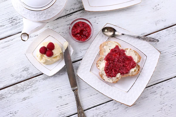 Toast with homemade butter and raspberry jam — Stock Photo, Image