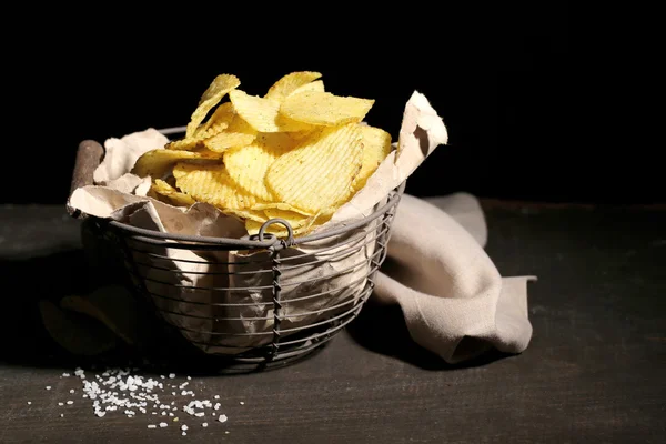 Potato chips in metal basket — Stock Photo, Image