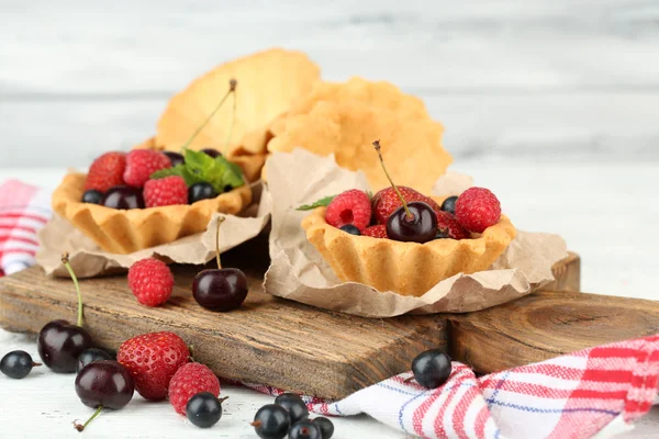 Tasty tartlets with berries — Stock Photo, Image