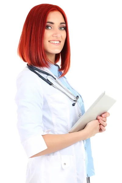 Young beautiful doctor holding tablet isolated on white — Stock Photo, Image