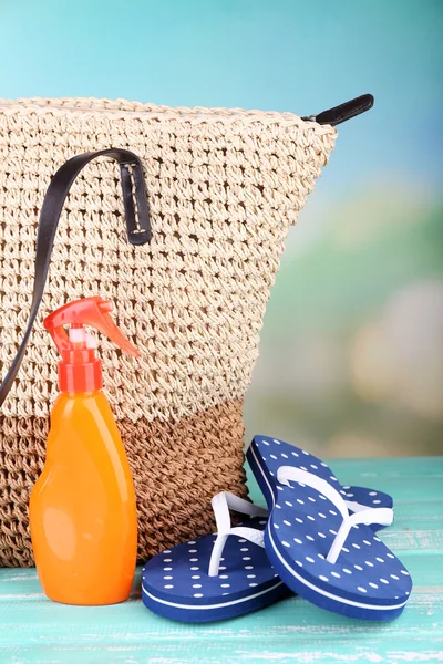 Summer wicker bag with accessories — Stock Photo, Image