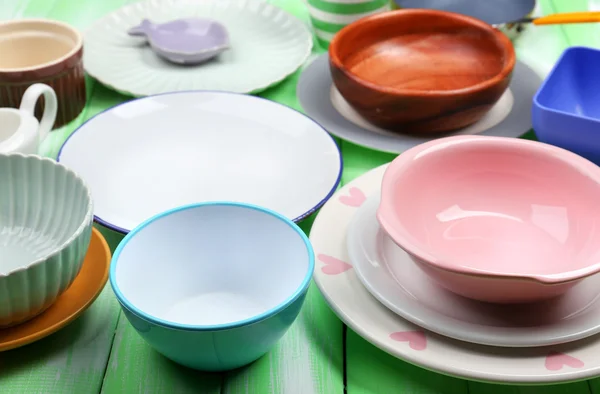 Different tableware on wooden background — Stock Photo, Image