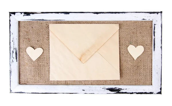 Marco de madera con carta de amor aislada en blanco —  Fotos de Stock