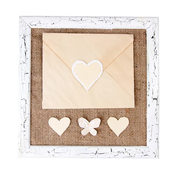 Cornice in legno con lettera d'amore isolata su bianco — Foto Stock