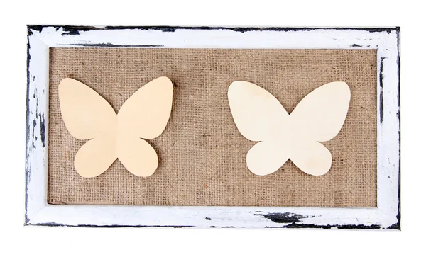 Marco de madera con mariposas de papel aisladas en blanco — Foto de Stock