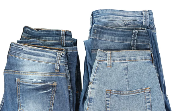 Two stacks fashion blue jeans isolated on white — Stock Photo, Image