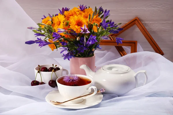 Cup of fresh herbal tea on table — Stock Photo, Image