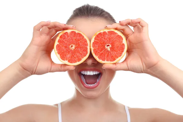 Beautiful girl with grapefruit, isolated on white — Stock Photo, Image