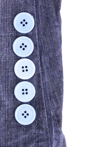 Colorful sewing buttons on jeans isolated on white — Stock Photo, Image