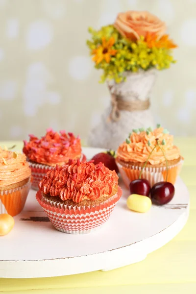 Tasty cupcakes on table — Stock Photo, Image
