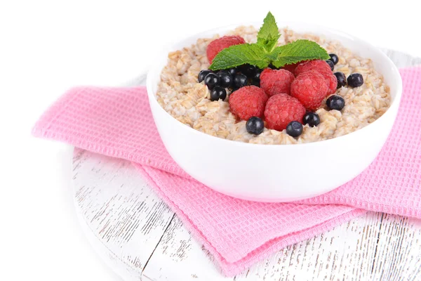 Tasty oatmeal with berries — Stock Photo, Image