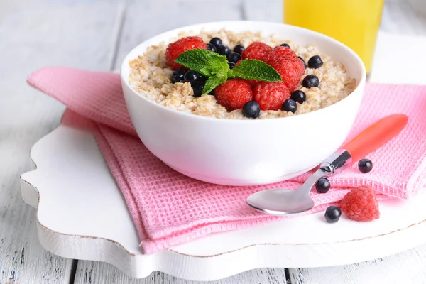 Tasty oatmeal with berries