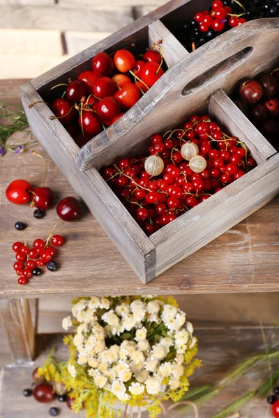 Fresh berries in wooden box — Stock Photo, Image