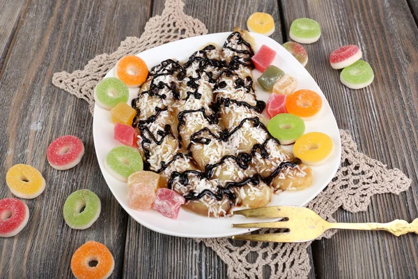 Sweetened fried banana on plate, close-up — Stock Photo, Image