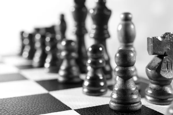 Chess board with chess pieces isolated on white — Stock Photo, Image