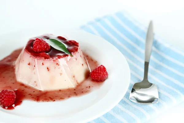 Panna Cotta with raspberry sauce, isolated on white — Stock Photo, Image