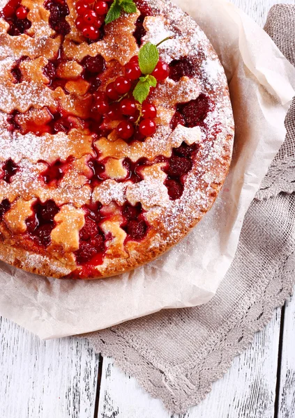 Tasty cake with berries on table close-up — Stock Photo, Image