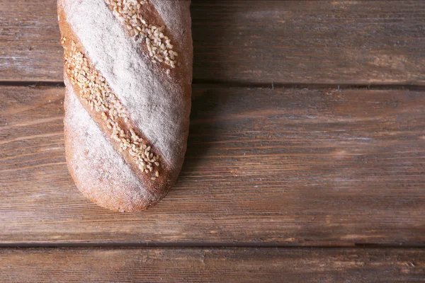 Loaf pada latar belakang kayu — Stok Foto