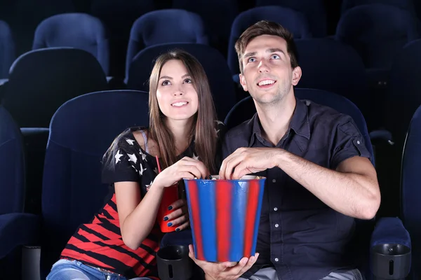 Young couple watching movie in cinema — Stock Photo, Image