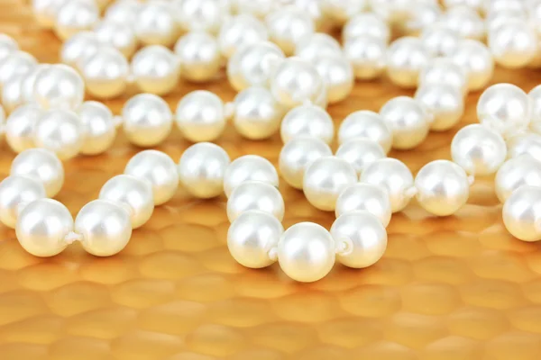 Color beads on bright background, close-up — Stock Photo, Image