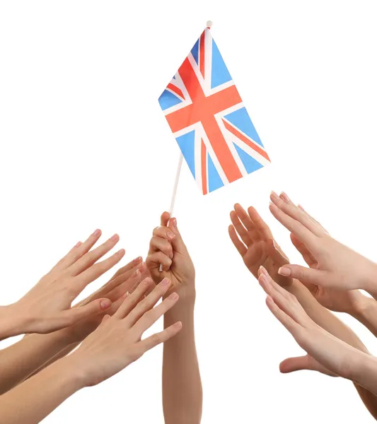 United Kingdom flag and many hands,, isolated on white — Stock Photo, Image