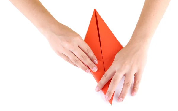 Manos haciendo conejo de origami, de cerca, aislado en blanco — Foto de Stock