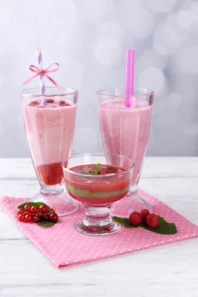 Glasses of tasty smoothies — Stock Photo, Image