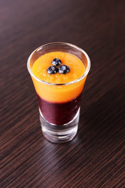Glass of blueberry and apricot smoothies — Stock Photo, Image