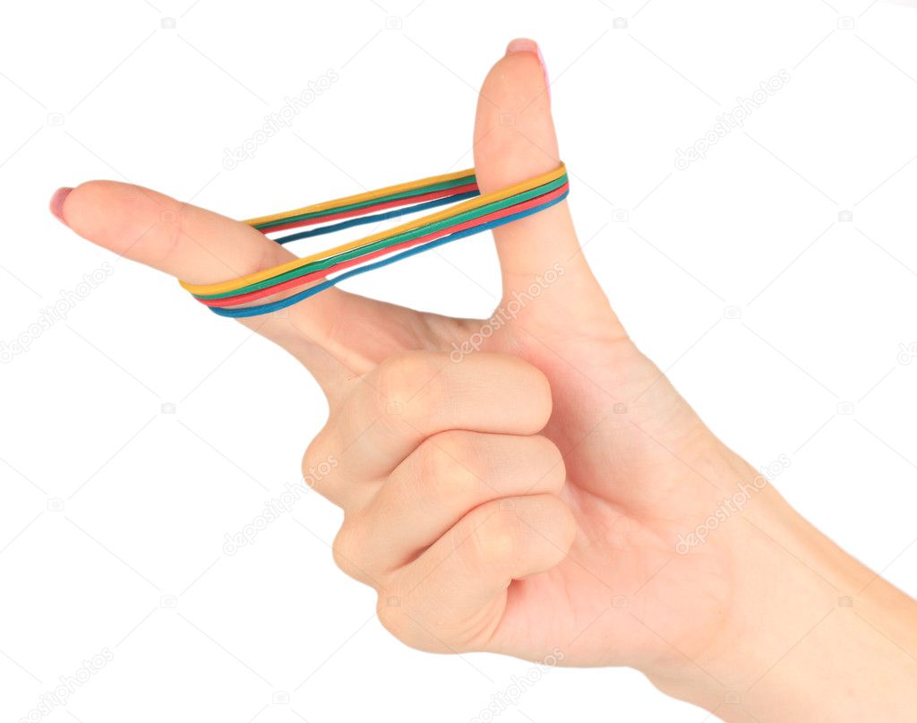 Colorful rubber bands in hand isolated on white