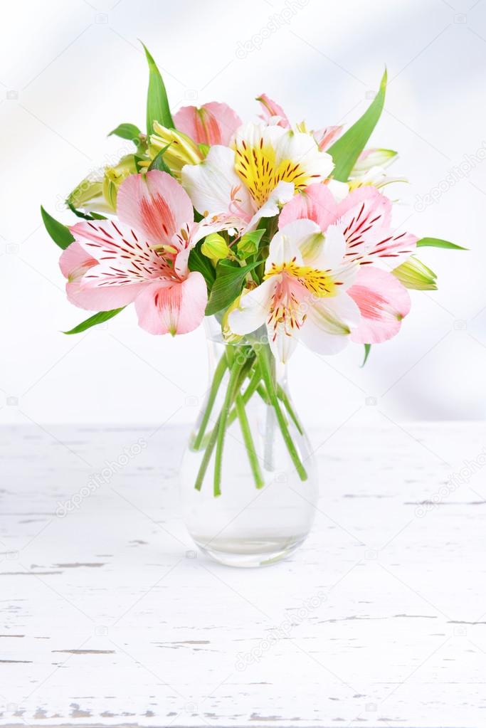 Alstroemeria flowers in vase Stock Photo by ©belchonock 49527161