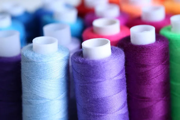 Multicolor sewing threads background — Stock Photo, Image