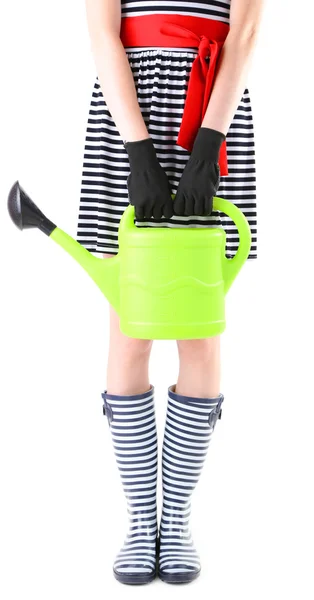 Young woman in rubber boots holding watering can, isolated on white — Stock Photo, Image