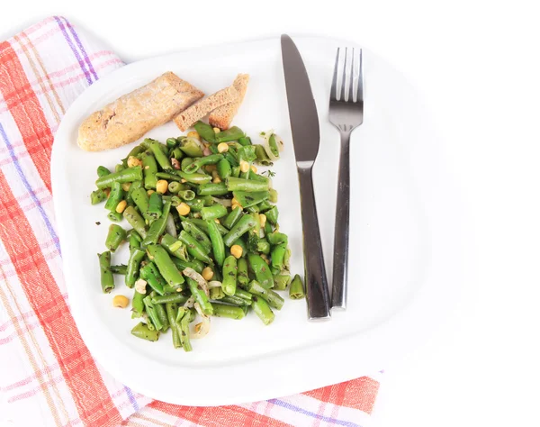 Salad with green beans and corn on plate, isolated on white — Stock Photo, Image