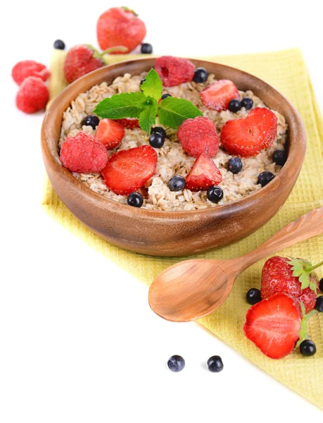 Tasty oatmeal with berries isolated on white — Stock Photo, Image