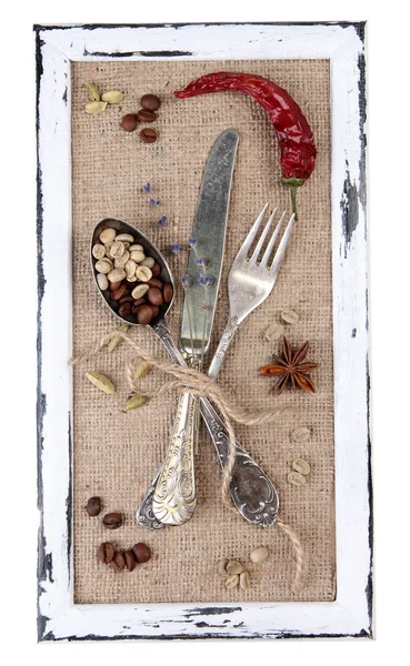 Wooden frame and vintage cutlery and spices  isolated on white — Stock Photo, Image