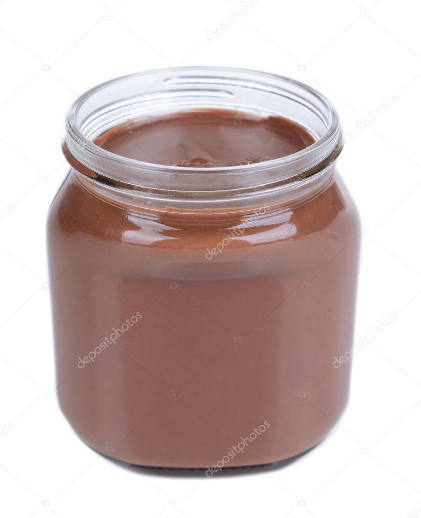 Sweet chocolate cream in jar isolated on white