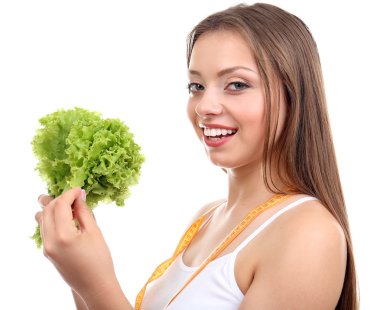 Biber ve ölçüm bandı ile kız