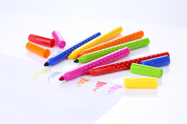 Bright markers isolated on white