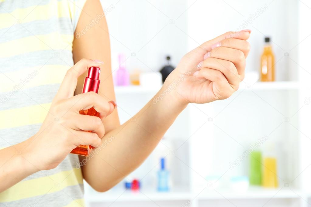Woman testing perfume