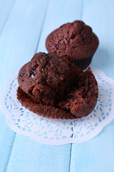 Chocolate muffin on wooden background