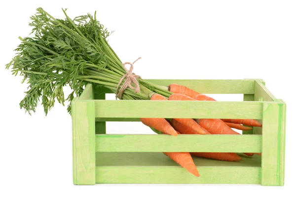 Fresh carrot in crate isolated on white — Stock Photo, Image