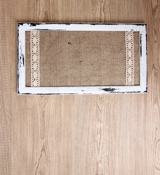 Wooden frame on wooden background — Stock Photo, Image