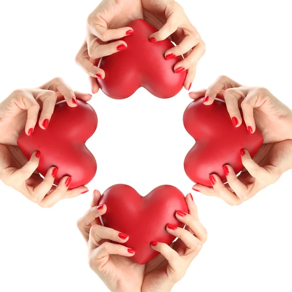 Red hearts in woman hands — Stock Photo, Image