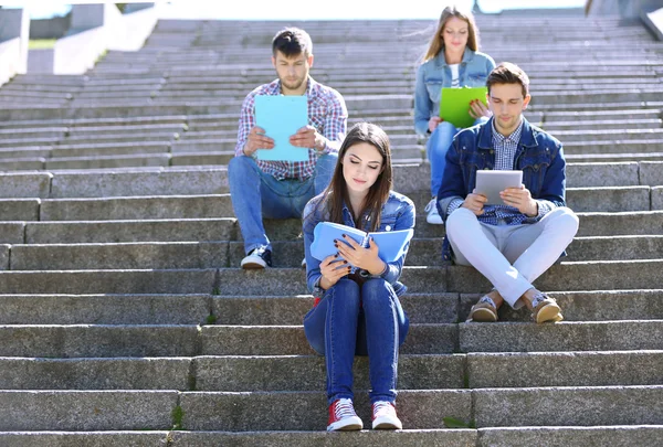 Happy students in park — Stock Photo, Image